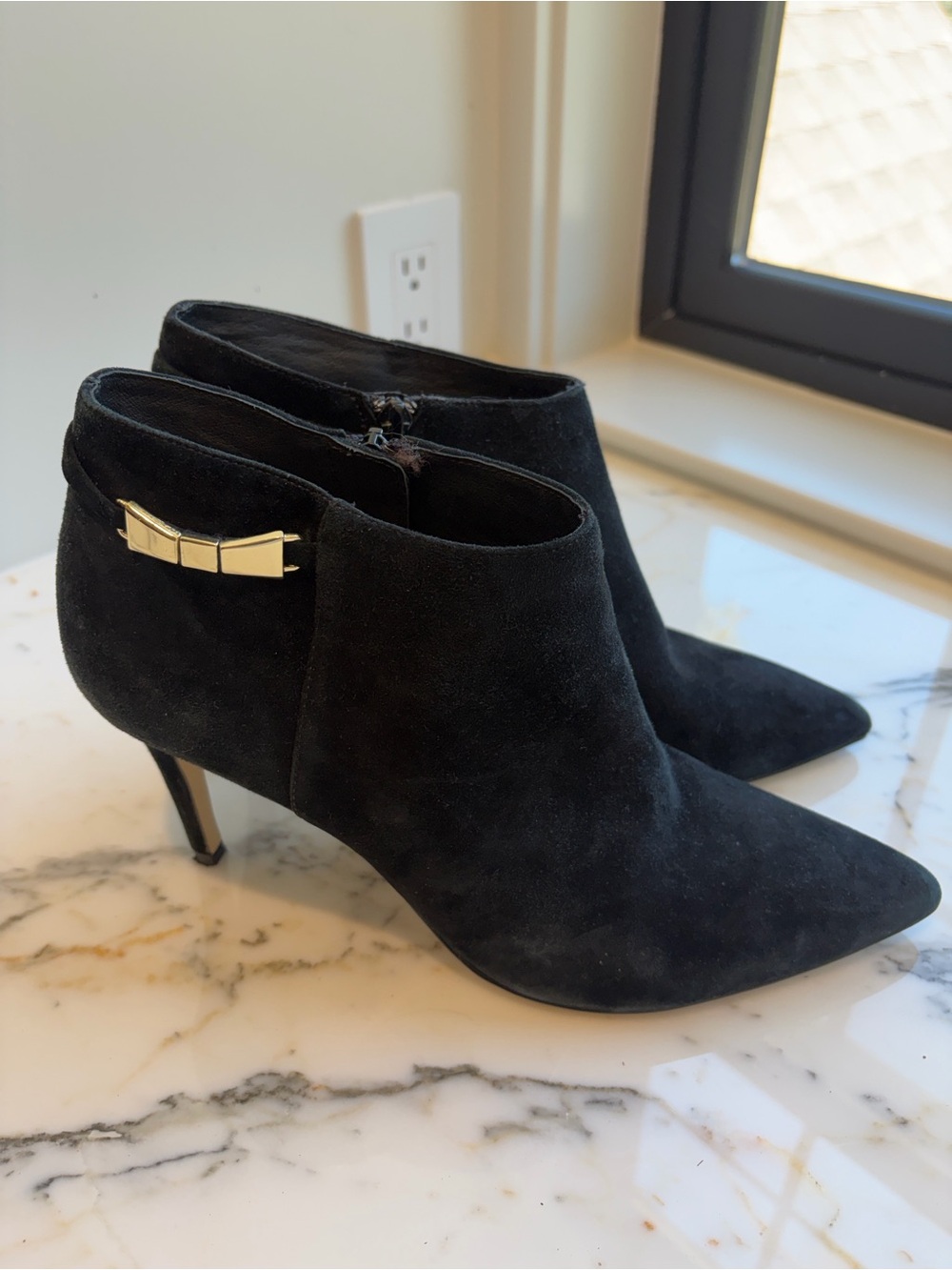 kate spade Black Suede Pointed Toe Ankle Booties with Gold Bow Accent